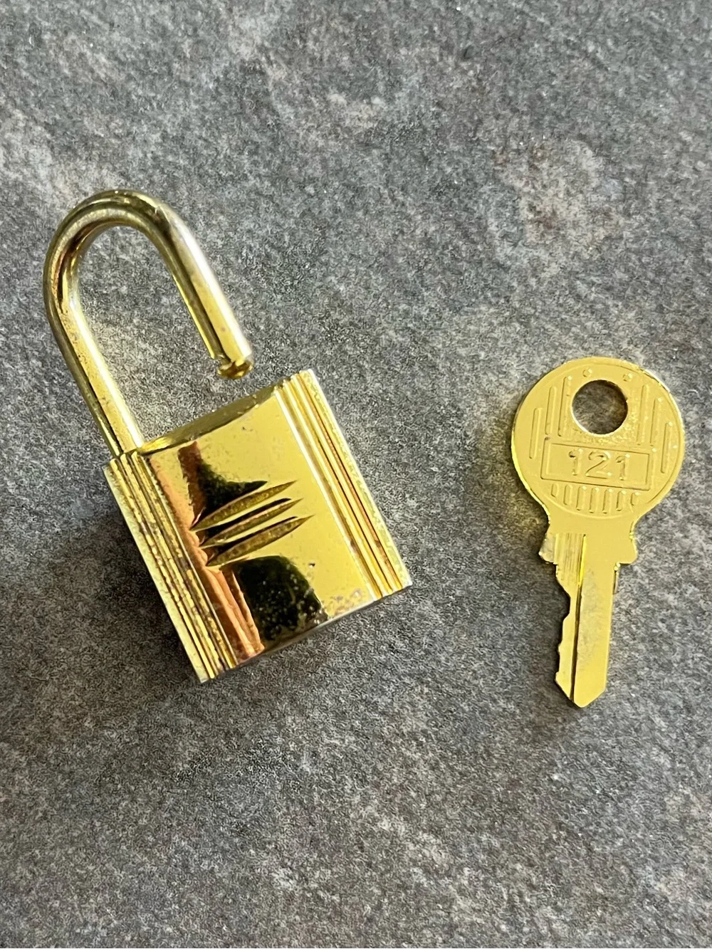Vintage Hermes “H” Gold Tone Padlock and Key Set